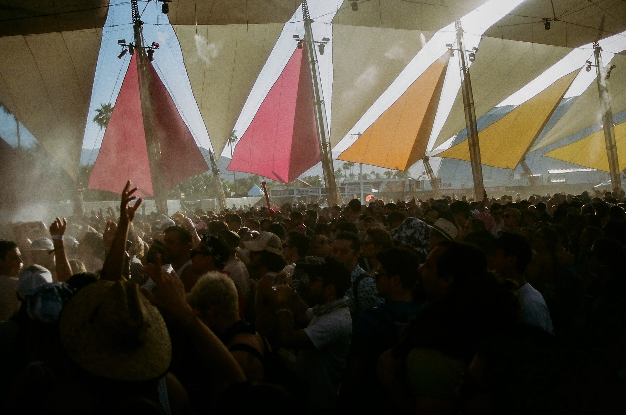 Festival goers gather inside the DoLaB tent to watch a performance.