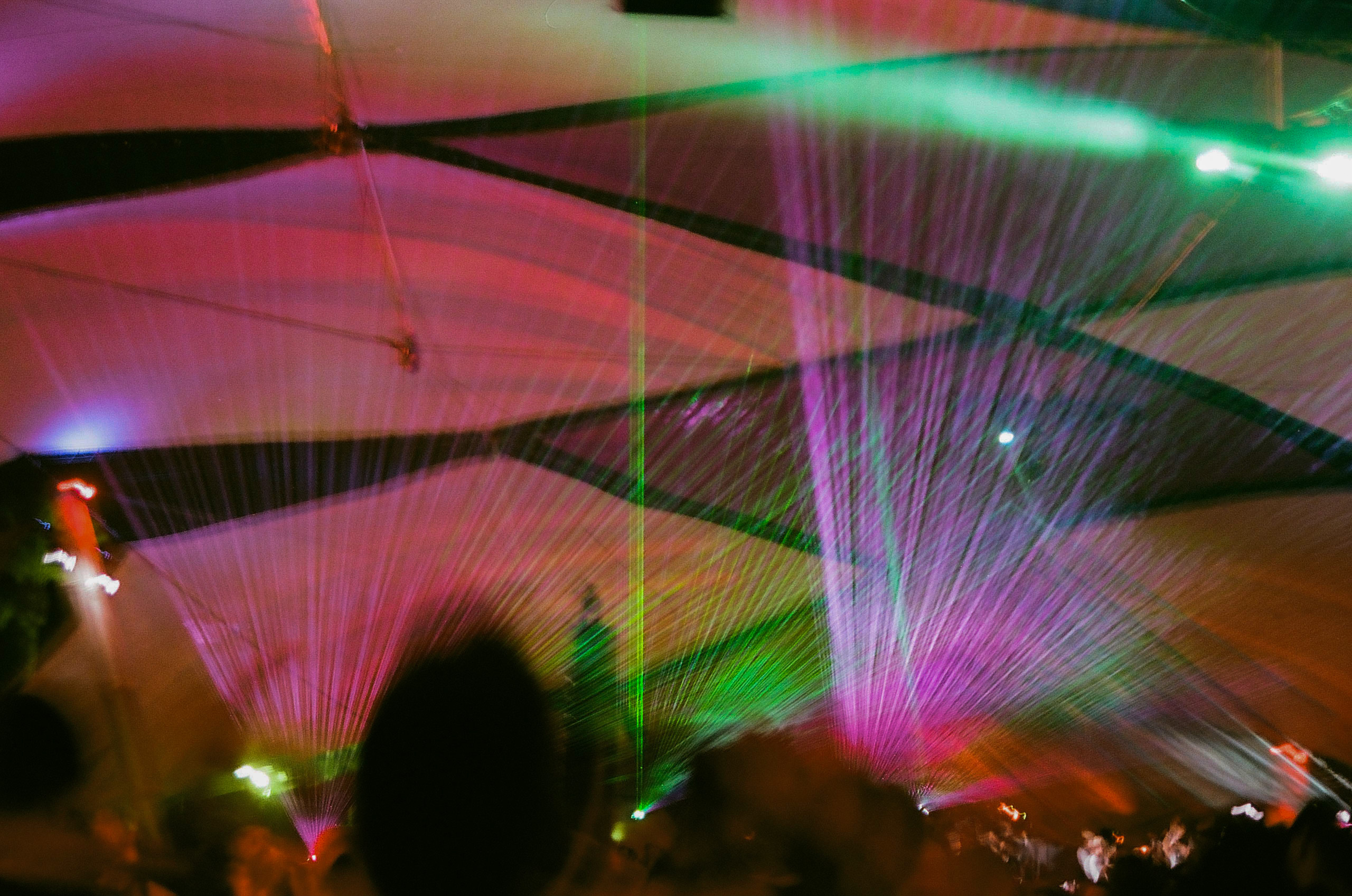 Lasers shine over the crowd at the DoLaB at Coachella Valley Music and Arts Festival 2022.