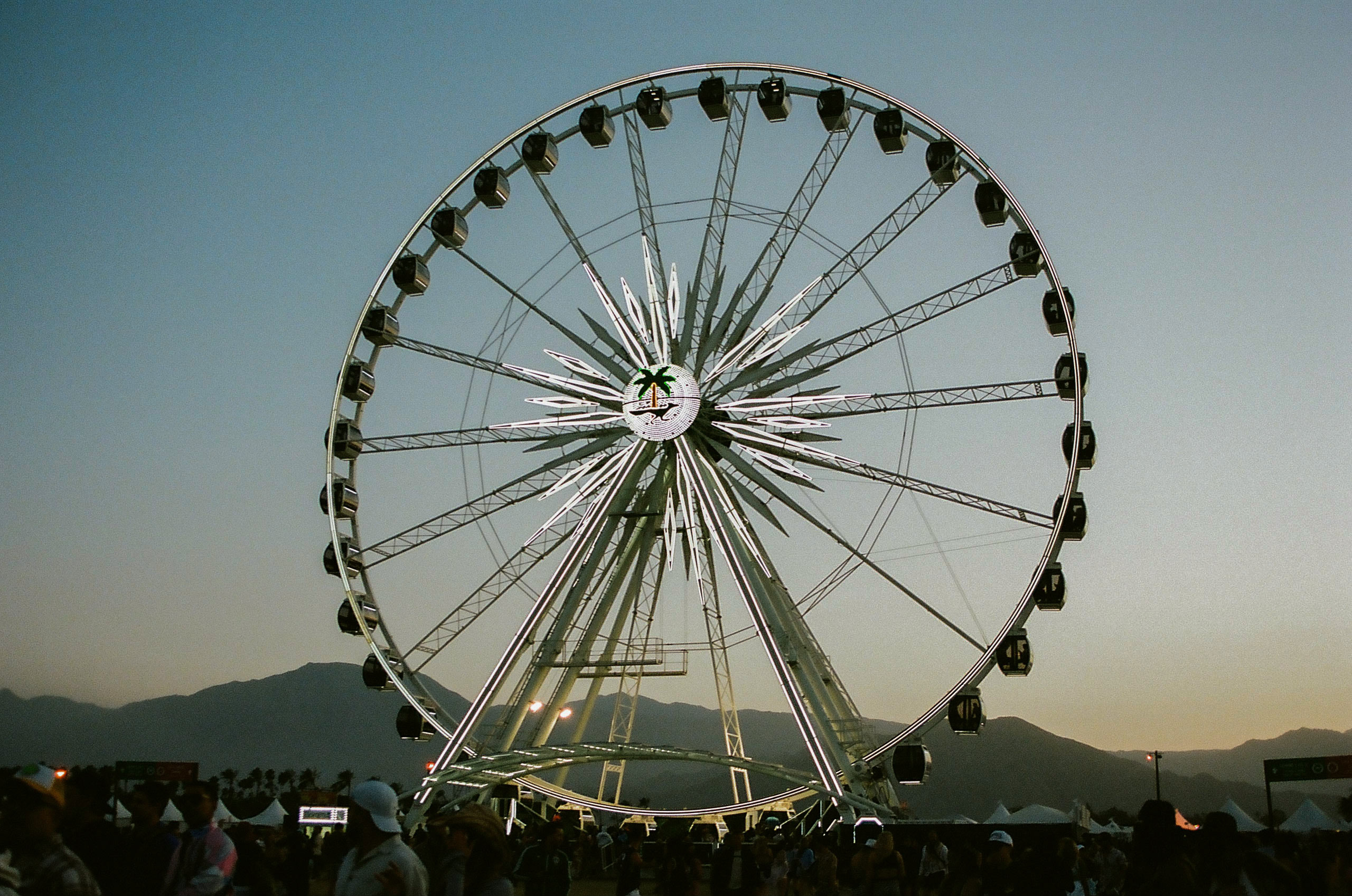 The ferris wheel starting to light up at Coachella Valley Music and Arts Festival 2022.