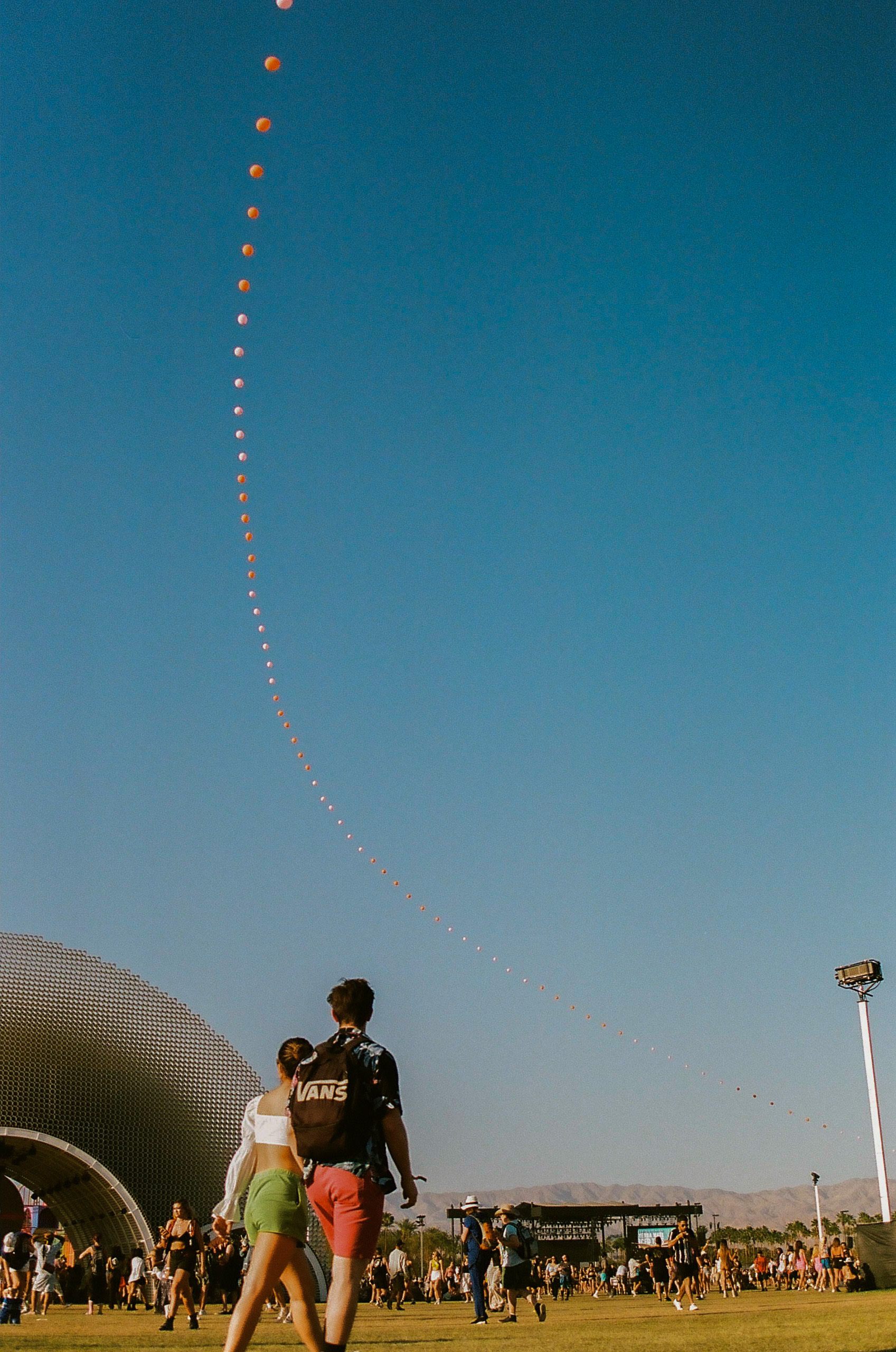 The iconic chain of balloons flying at Coachella Valley Music and Arts Festival 2022.