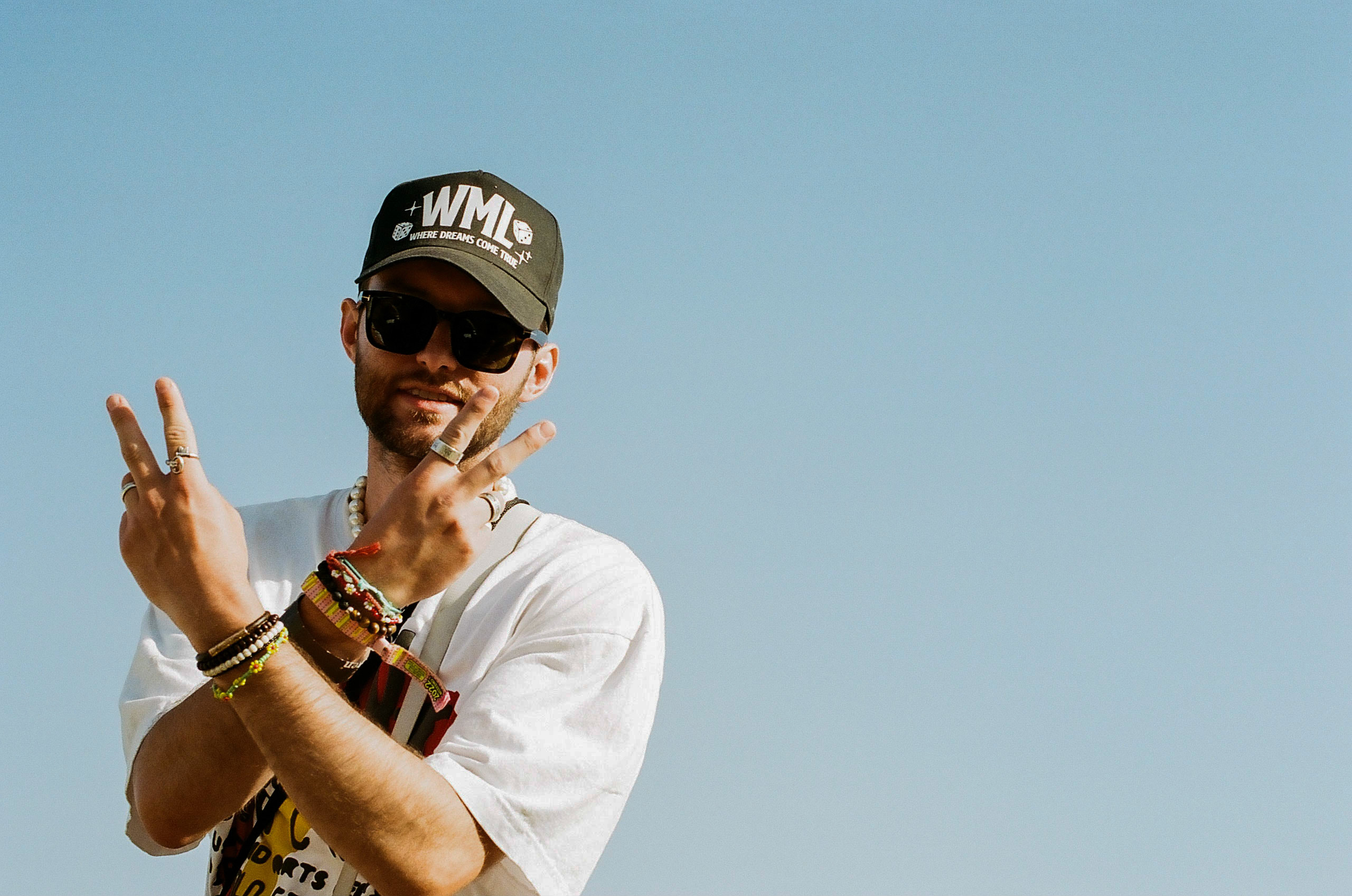 Friend poses for a photo in the beer garden at Coachella Valley Music and Arts Festival 2022.